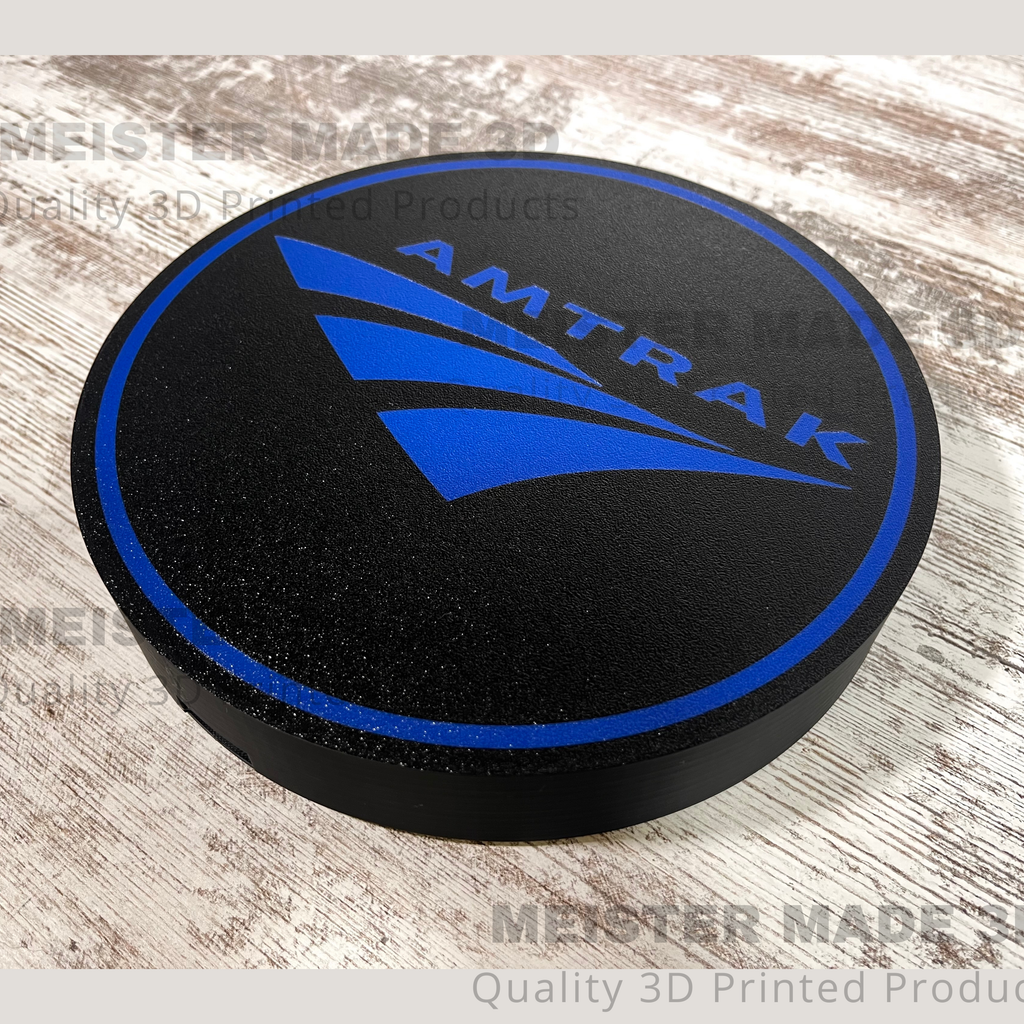 Amtrak LED sign close up with MeisterMade3D watermarked across the image on a white wood background