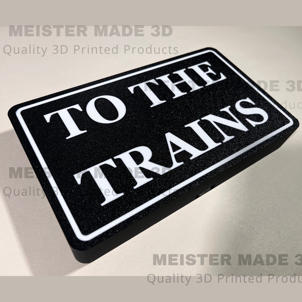 "To The Trains" LED illuminated sign for railroad enthusiasts