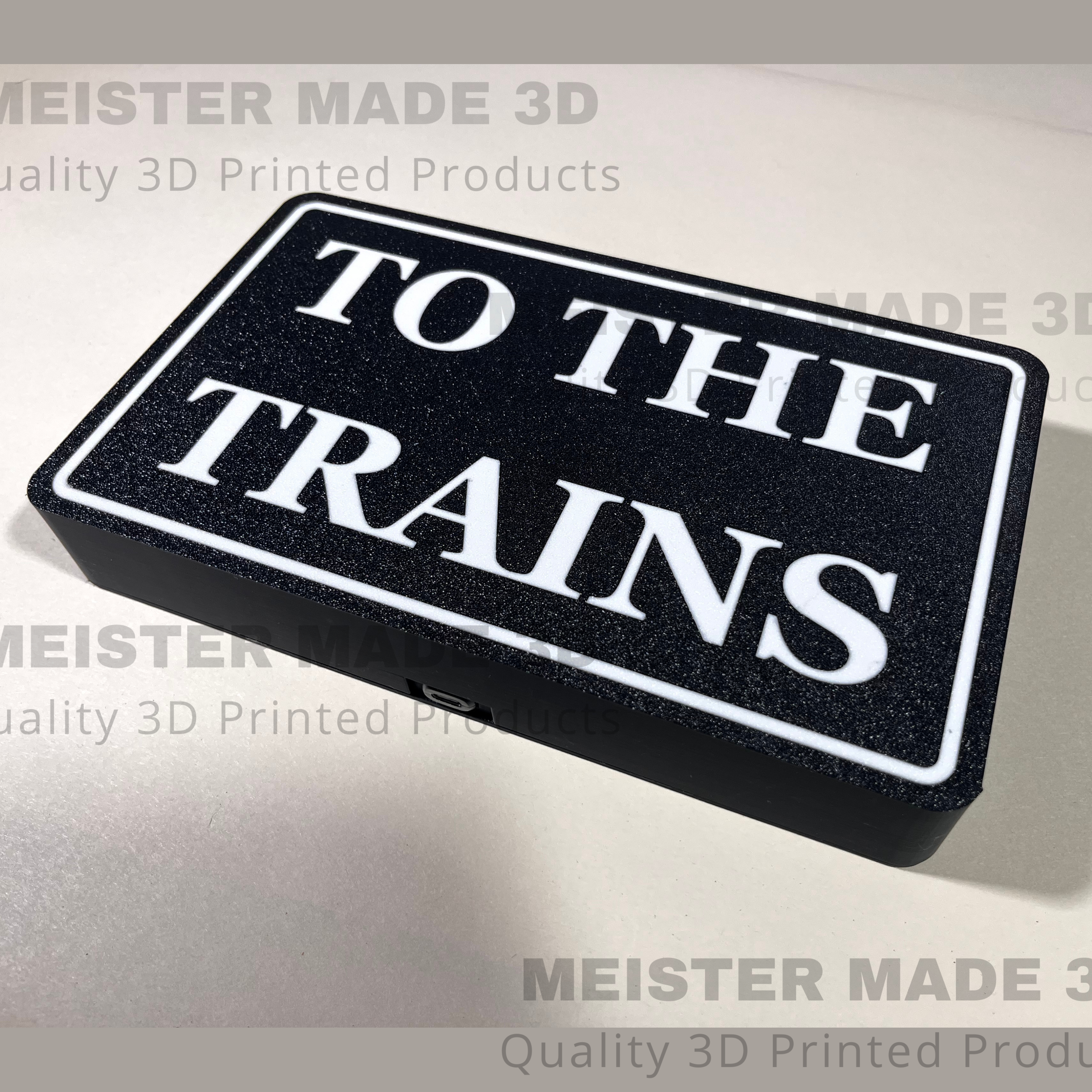 "To The Trains" LED illuminated sign for railroad enthusiasts