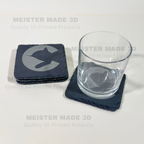 Four square slate coasters, each engraved with a Chessie System Logo. A glass sits on one of the coasters showing the functionality. The image includes repeated 'MEISTER MADE 3D Quality 3D Printed Products' watermarks on a plain light background.
