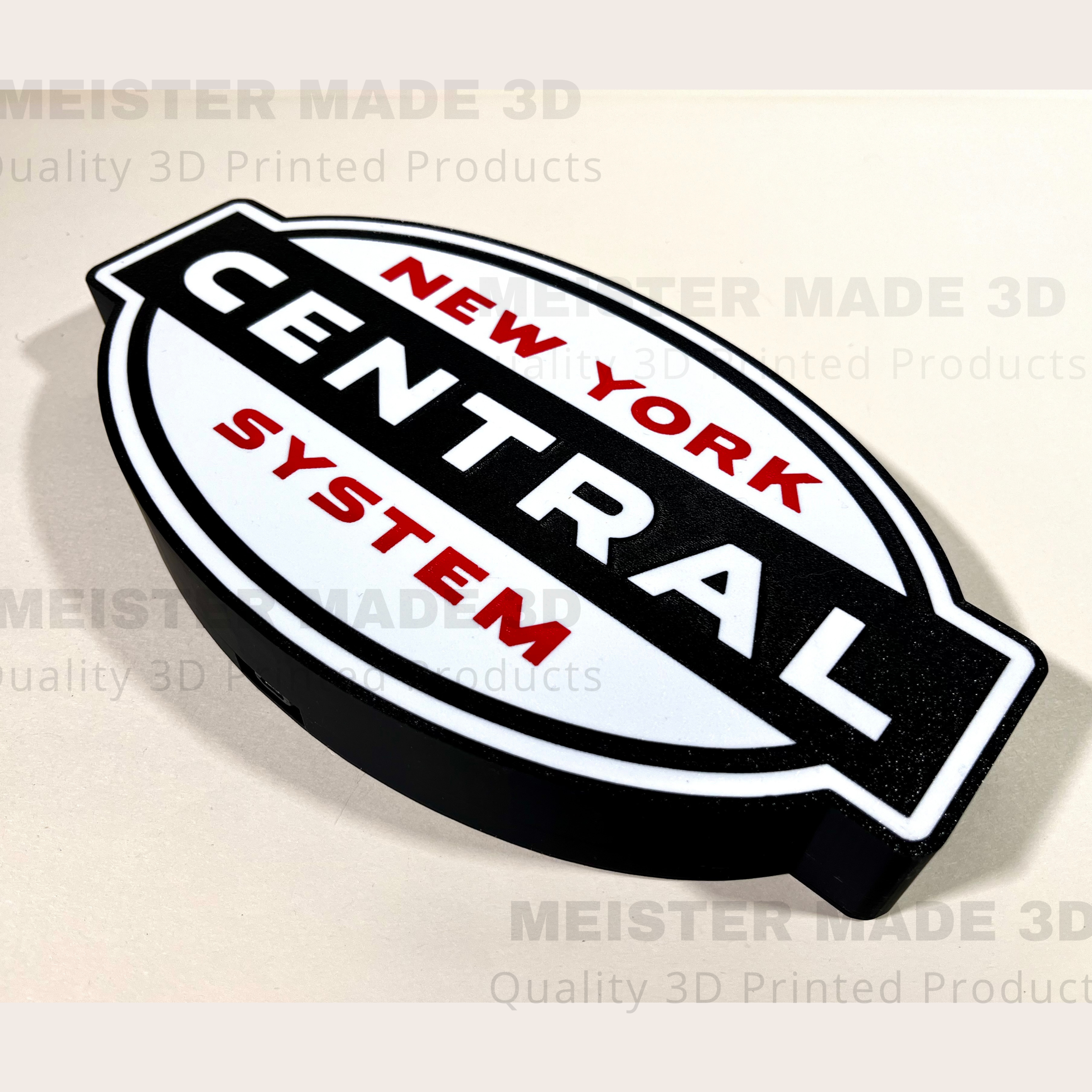 3D-printed New York Central System logo sign on a white background