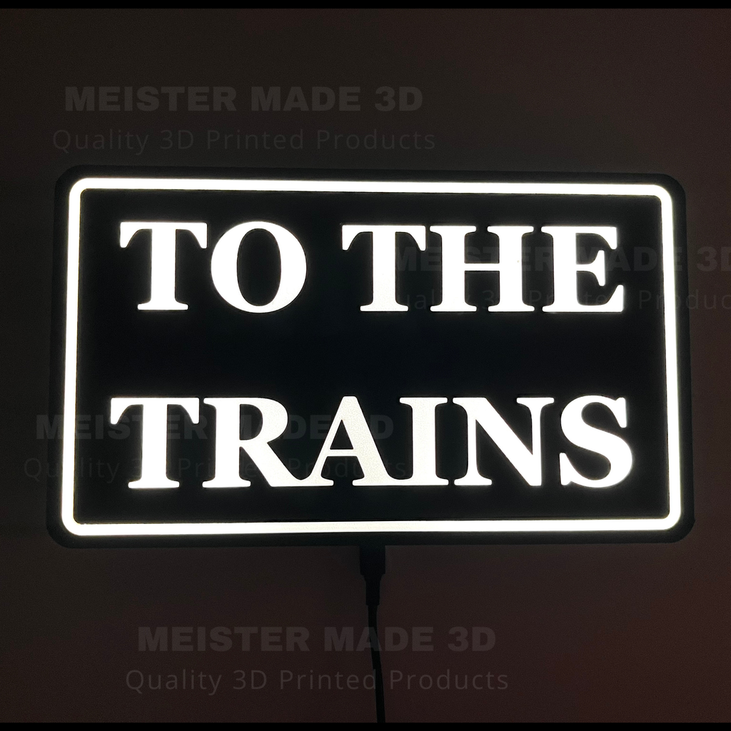 "To The Trains" LED illuminated sign for railroad enthusiasts
