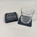 Set of coasters with 'Union Pacific 4014' design and a glass on a white background.