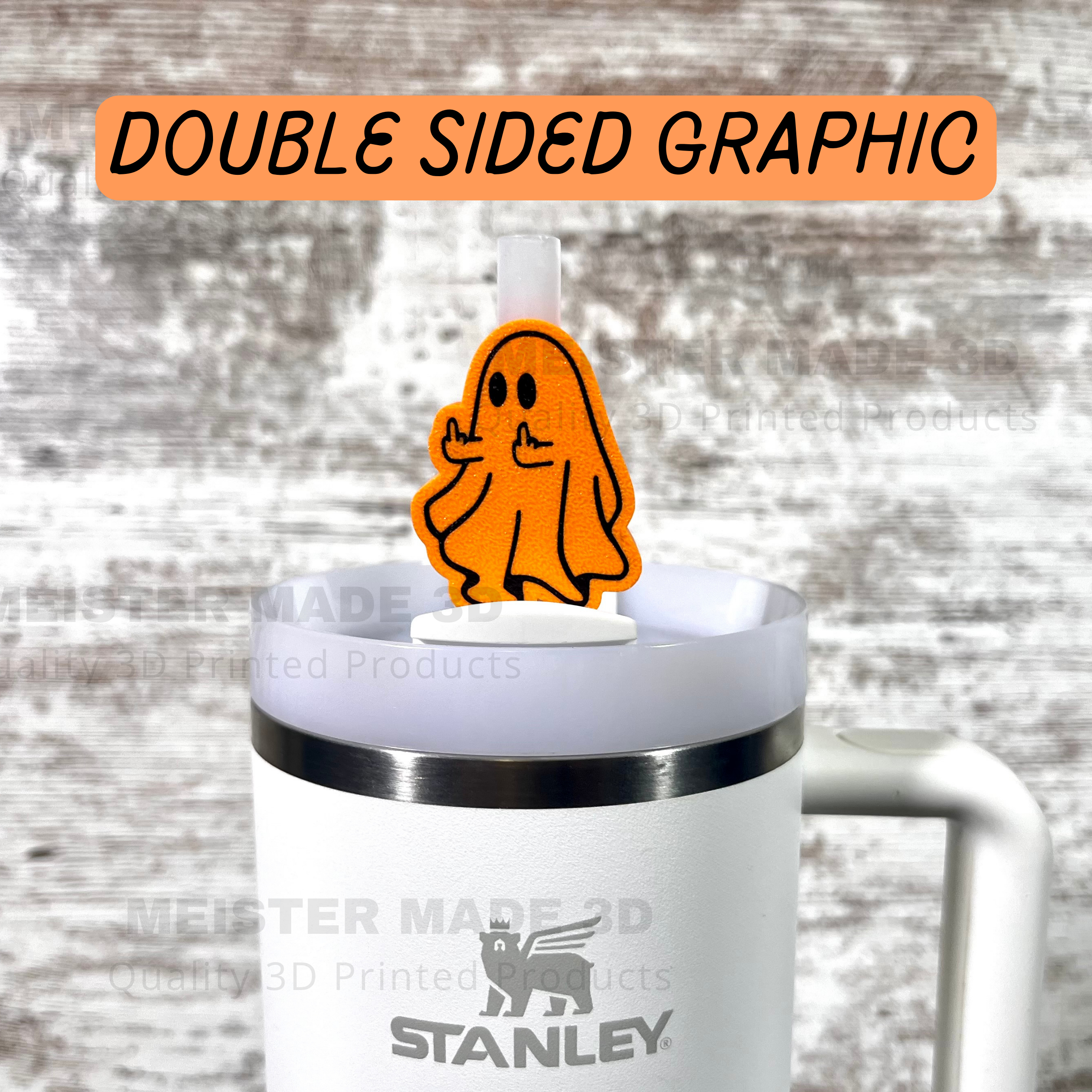 Orange ghost stanley straw buddy on a  white stanley tumbler with text "double sided graphic"
