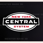Illuminated New York Central System logo on a black background