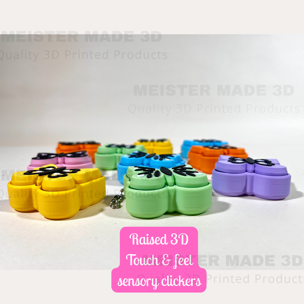 Colorful 3D printed touch and feel sensory clickers on a white background with 'Meister Made 3D' branding.