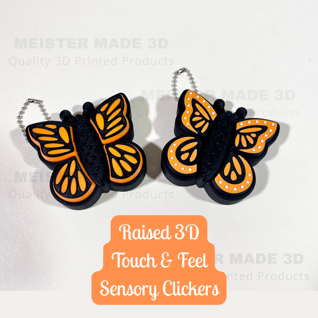 Butterfly-shaped sensory clickers with orange and black design on a white background, featuring raised 3d touch  & feel clickers