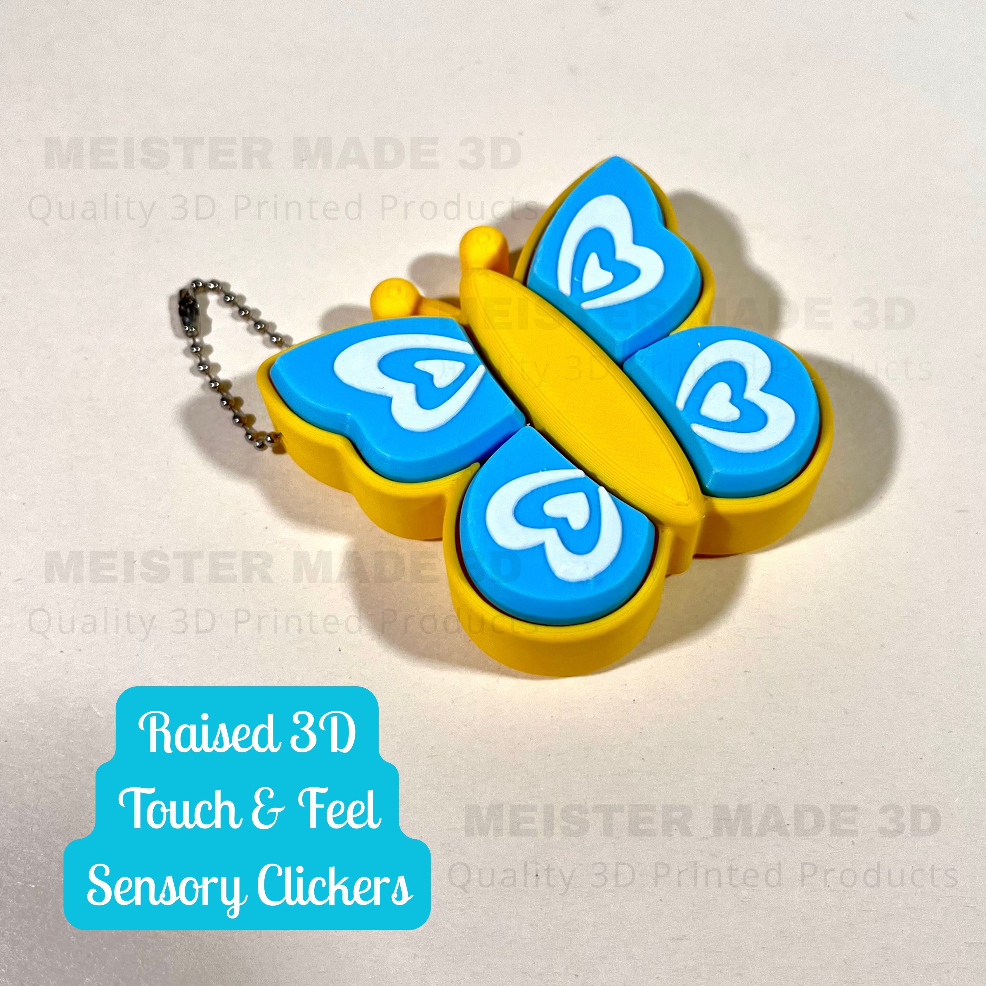 Butterfly-shaped keychain with blue wings and yellow body on a light background, Featuring raised 3d touch  & feel clickers