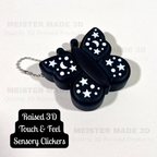 Black butterfly-shaped sensory clicker with white patterns on a white background, Featuring raised 3d touch  & feel clickers