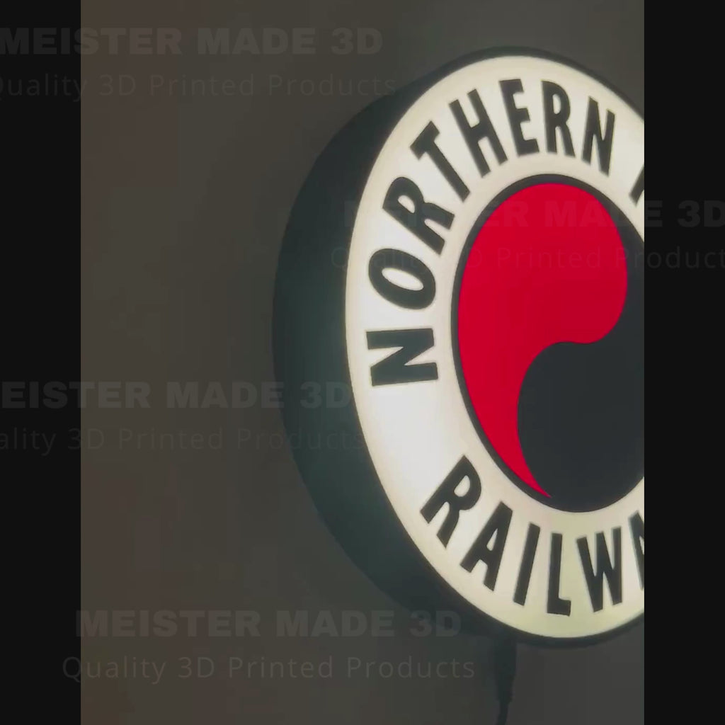 Video showing the Northern Pacific Railway sign illuminated and hanging on the wall. 
